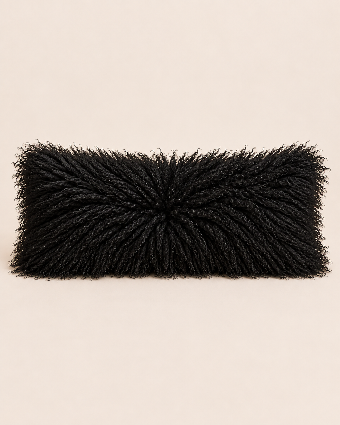 Black long rectangular Mongolian sheepskin cushion viewed from the front