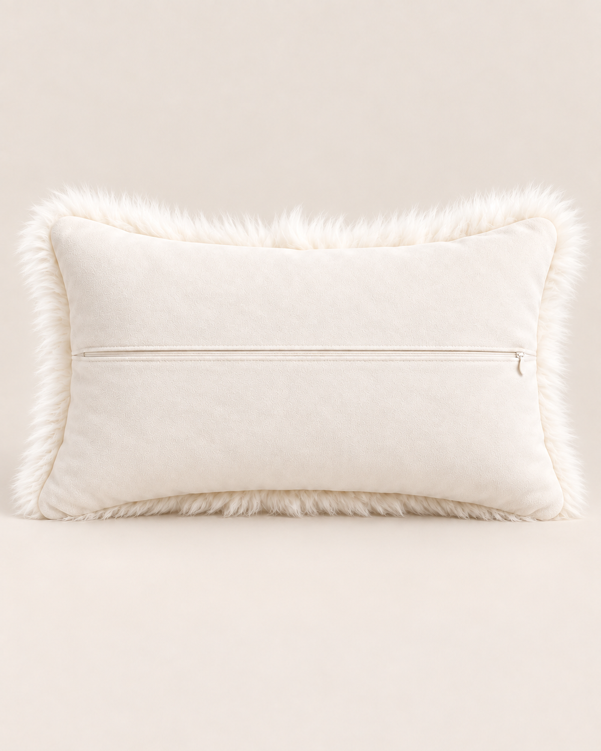 Woolsy Australian sheepskin cushion in Ivory, 12 x 20 inches, polysuede back with centre zipper