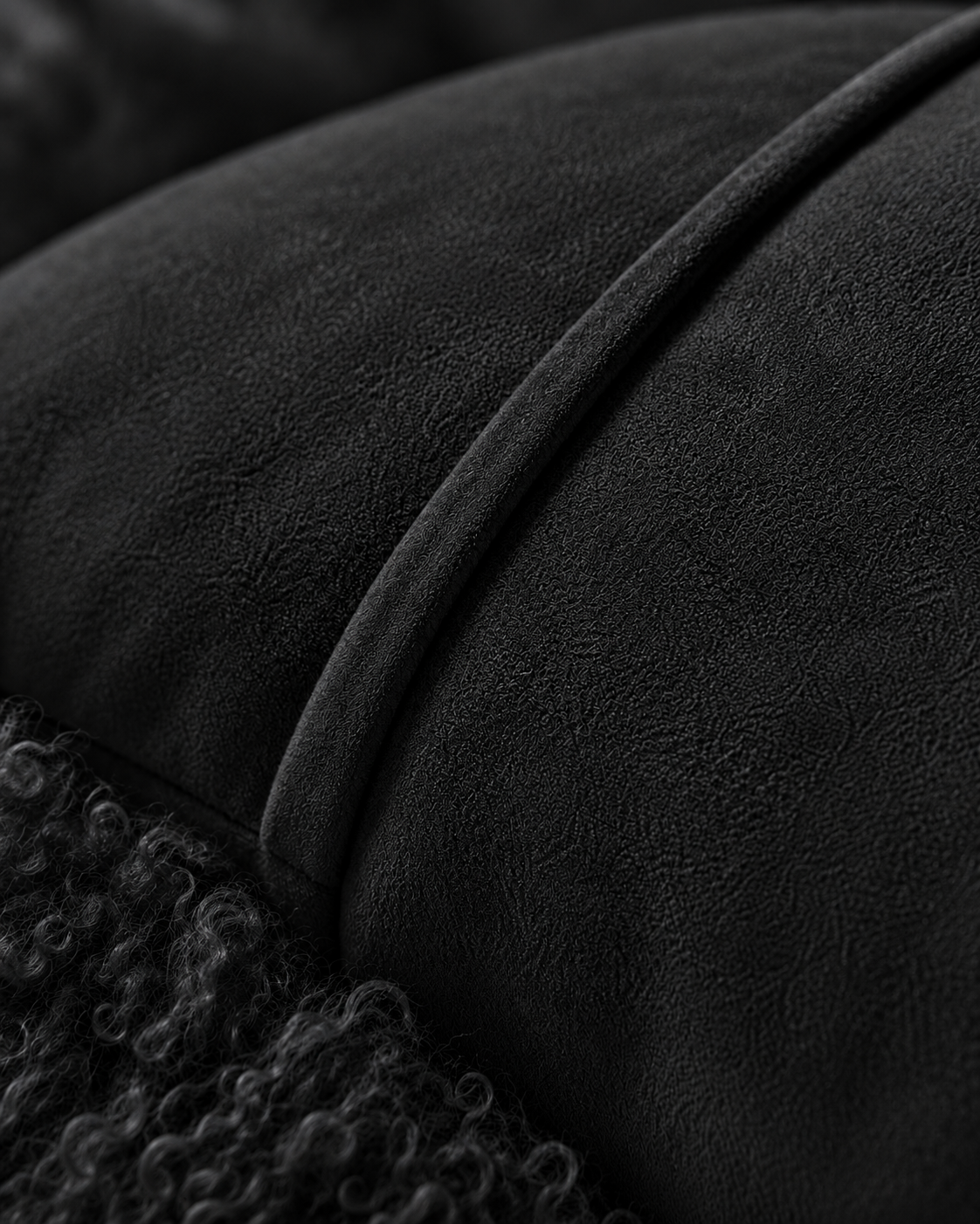 Close-up of the black cushion backing and concealed zipper